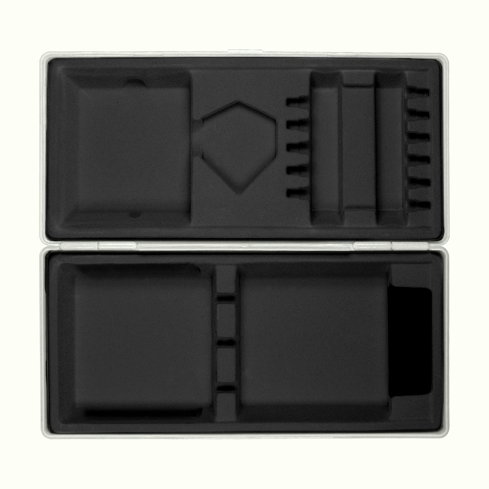 ABS box with custom print Die Abbildung zeigt eine geöffnete graue Box mit passgenauen Fächern aus schwarzem Schaumstoff. Die Box liegt auf einem hellgelben Hintergrund.