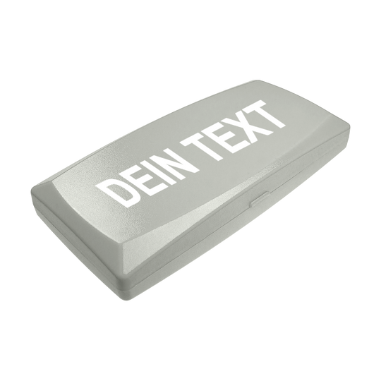 ABS box with custom print Auf dem Bild ist eine graue Kunststoffbox zu sehen. Auf dem Deckel steht in großen weißen Buchstaben "DEIN TEXT".
