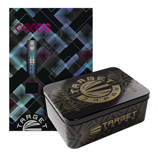 Das Bild zeigt die "Target Japan Kaze Series Ceros 03 Softdarts - 19g" in einer dekorativen Verpackung. Neben der bunten Kartonverpackung steht eine elegante schwarze Metallbox mit goldenen Verzierungen.