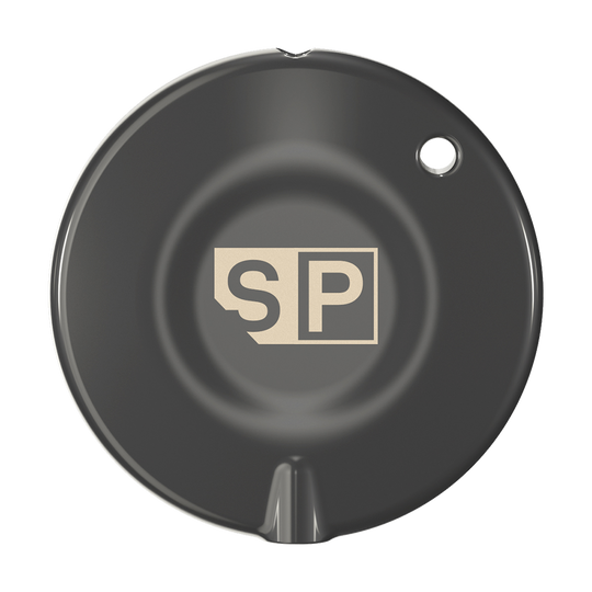 340007_Target_Swiss_Point_Key_Premium_1 Das Bild zeigt das Produkt "Target Swiss Point Key Premium". Es ist rund und schwarz mit einem "SP"-Logo in der Mitte.