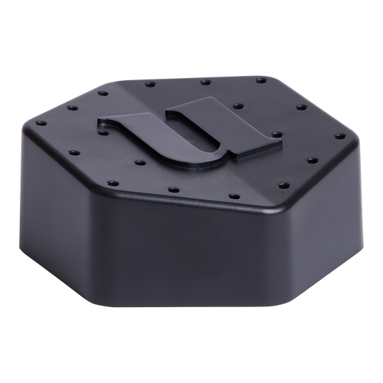 Unicorn dart stand Das Bild zeigt den Unicorn Dartständer in schwarzer Farbe. Er hat eine sechseckige Form mit mehreren kleinen Löchern und einem großen „U“ auf der Oberseite.