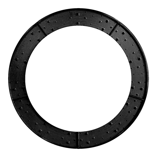 Das Bild zeigt einen schwarzen, ringförmigen Wurfkranz mit sichtbaren Noppen auf der Oberfläche. Der Ring ist in mehrere Segmente unterteilt.