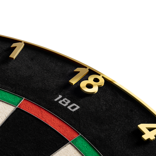 Precise 180 Endorphine Steel Dartboard with Numbered Ring - Gold Hier sieht man das Precise 180 Endorphine Steeldartboard mit Nummernring in Gold. Die goldene Dartscheibe ist für präzises Spielen konzipiert.