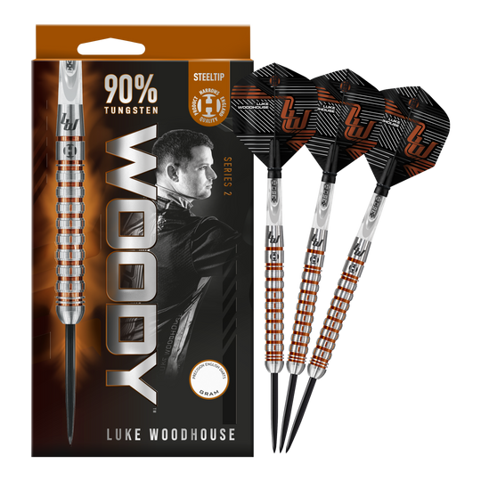 Harrow's Luke Woodhouse Series 2 steel darts Auf dem Bild sind die Harrows Luke Woodhouse Series 2 Steeldarts zu sehen. Die Verpackung zeigt das Dart-Design sowie ein Porträt von Luke Woodhouse und die Aufschrift "90% Tungsten".